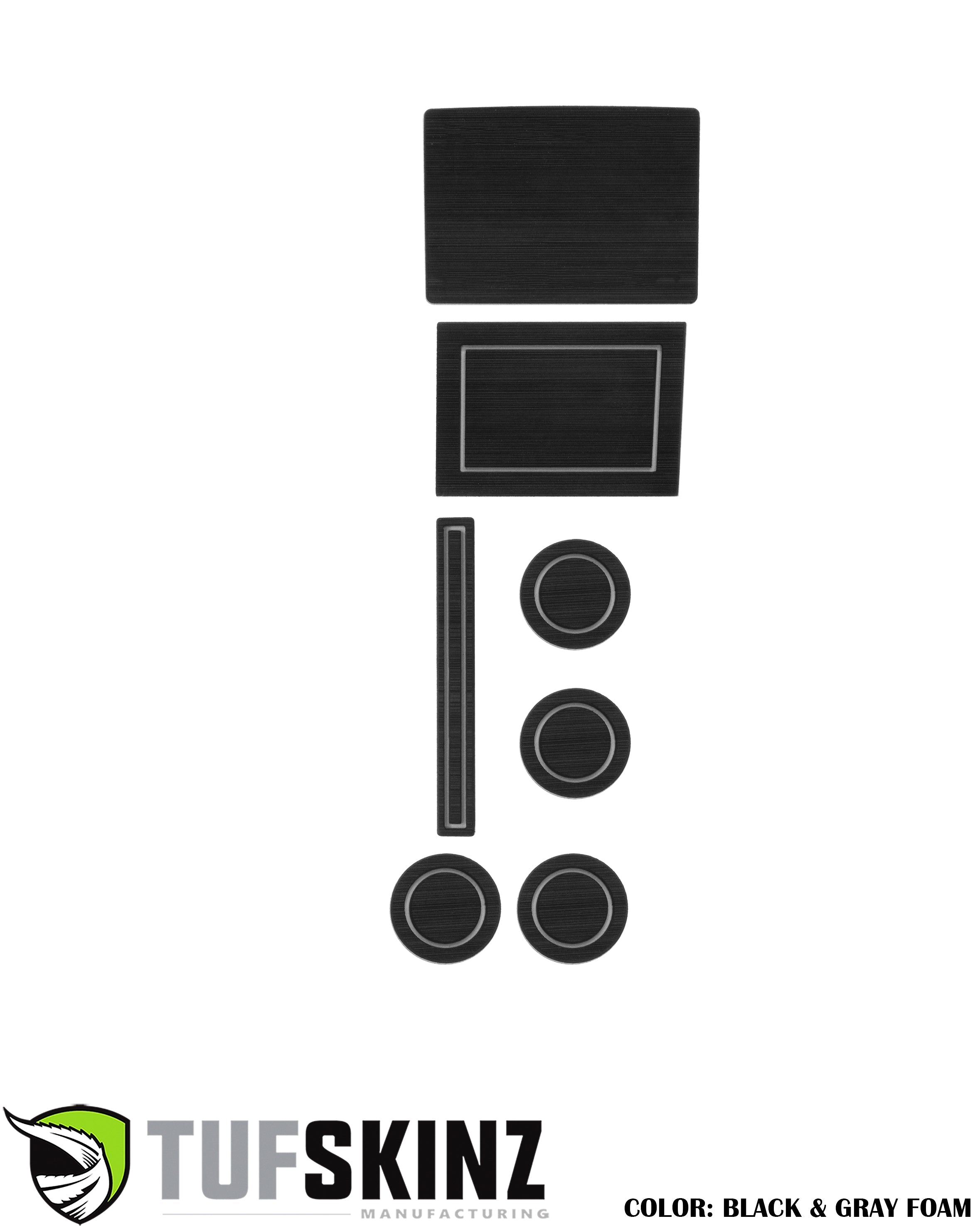 Black and gray foam insert kit for vehicle interior, custom cut shapes on white background