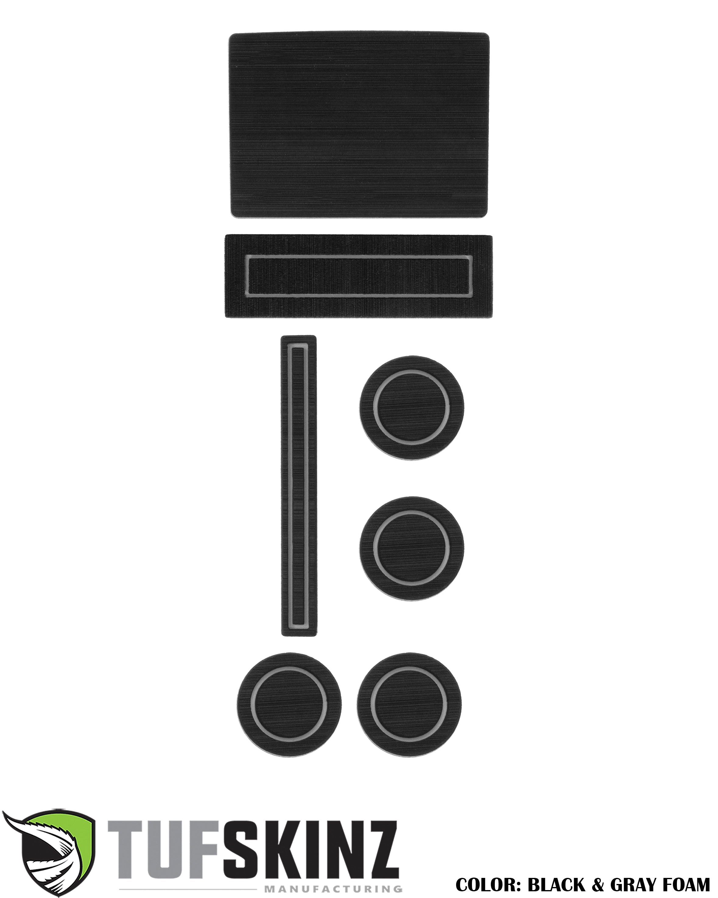 Black and gray foam automotive interior trim kit with seven custom-cut pieces for vehicle accessories.