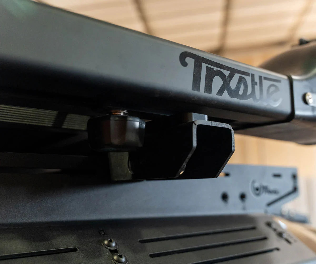 Close-up of vehicle roof rack mount system for overlanding and expedition gear