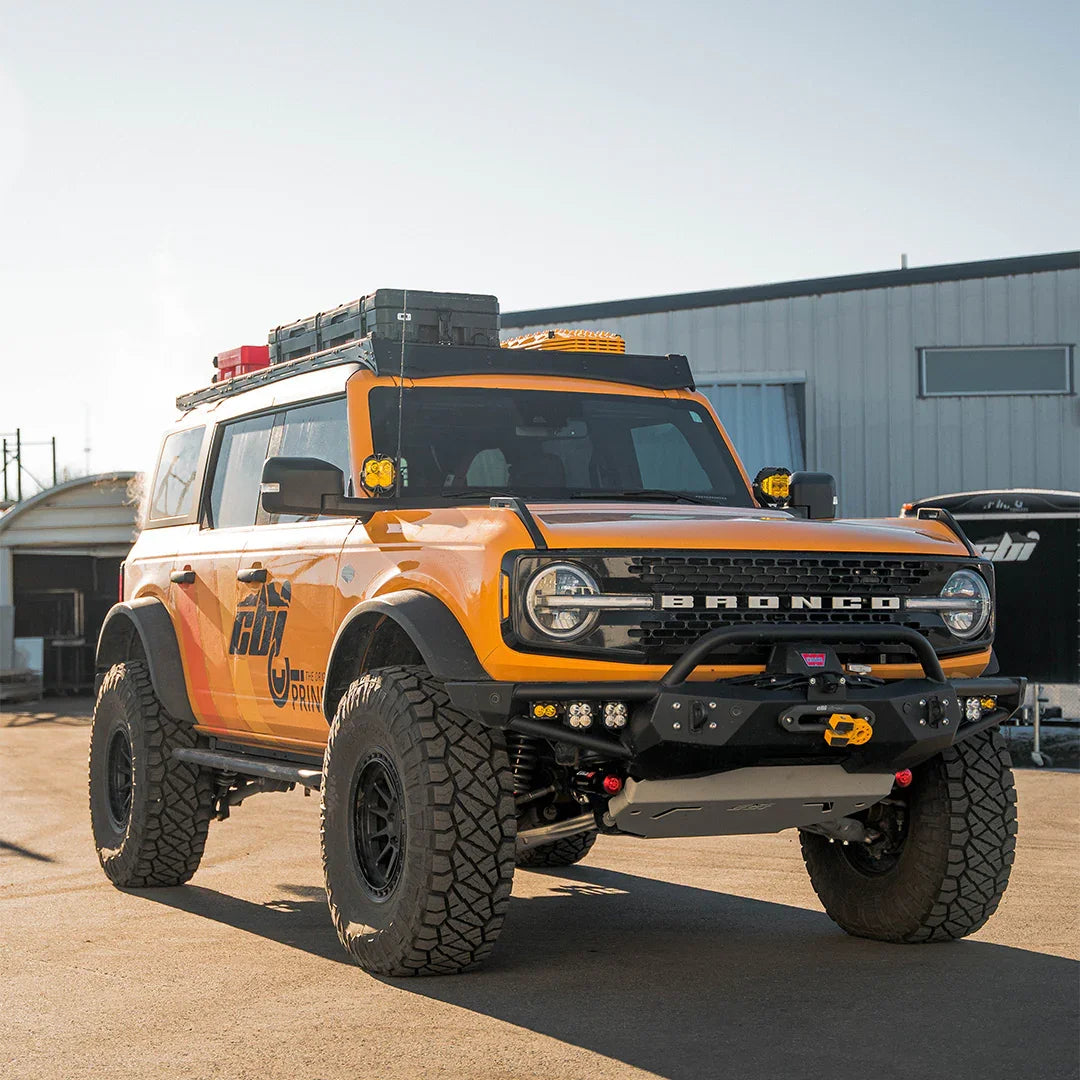 Ford Bronco with Prinsu Pro roof rack loaded with gear, off-road ready, parked outdoors
