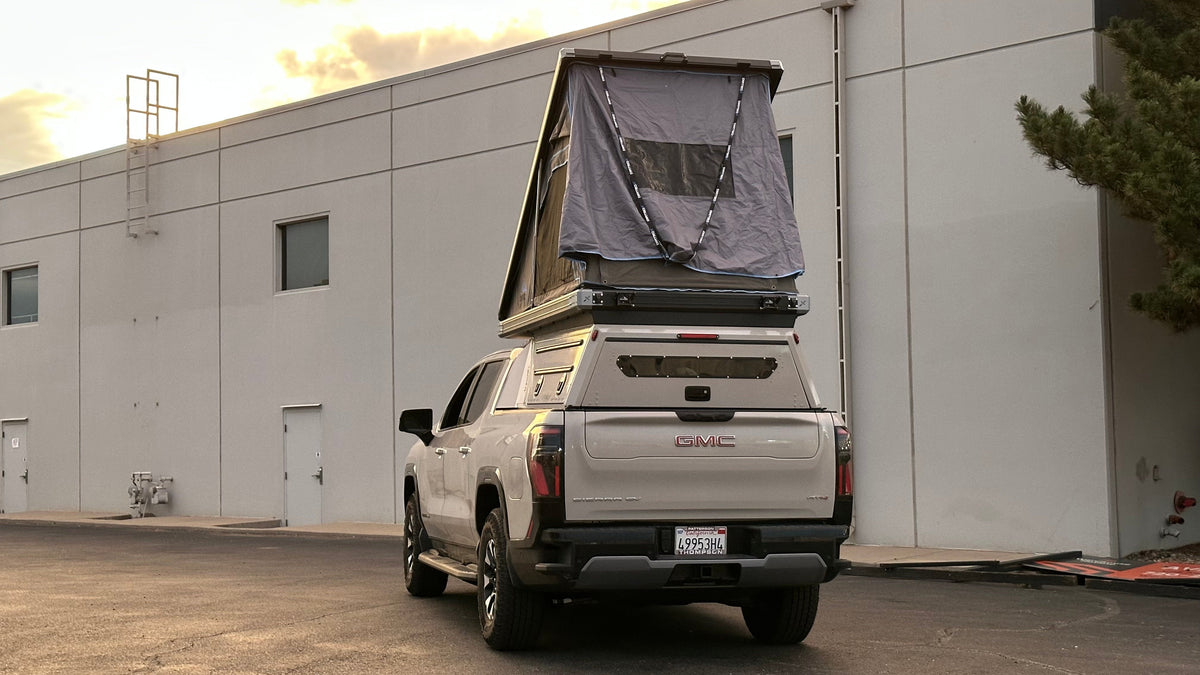 Dirtbox Overland EV pass-through canopy camper for Chevy Silverado EV and GMC Sierra EV