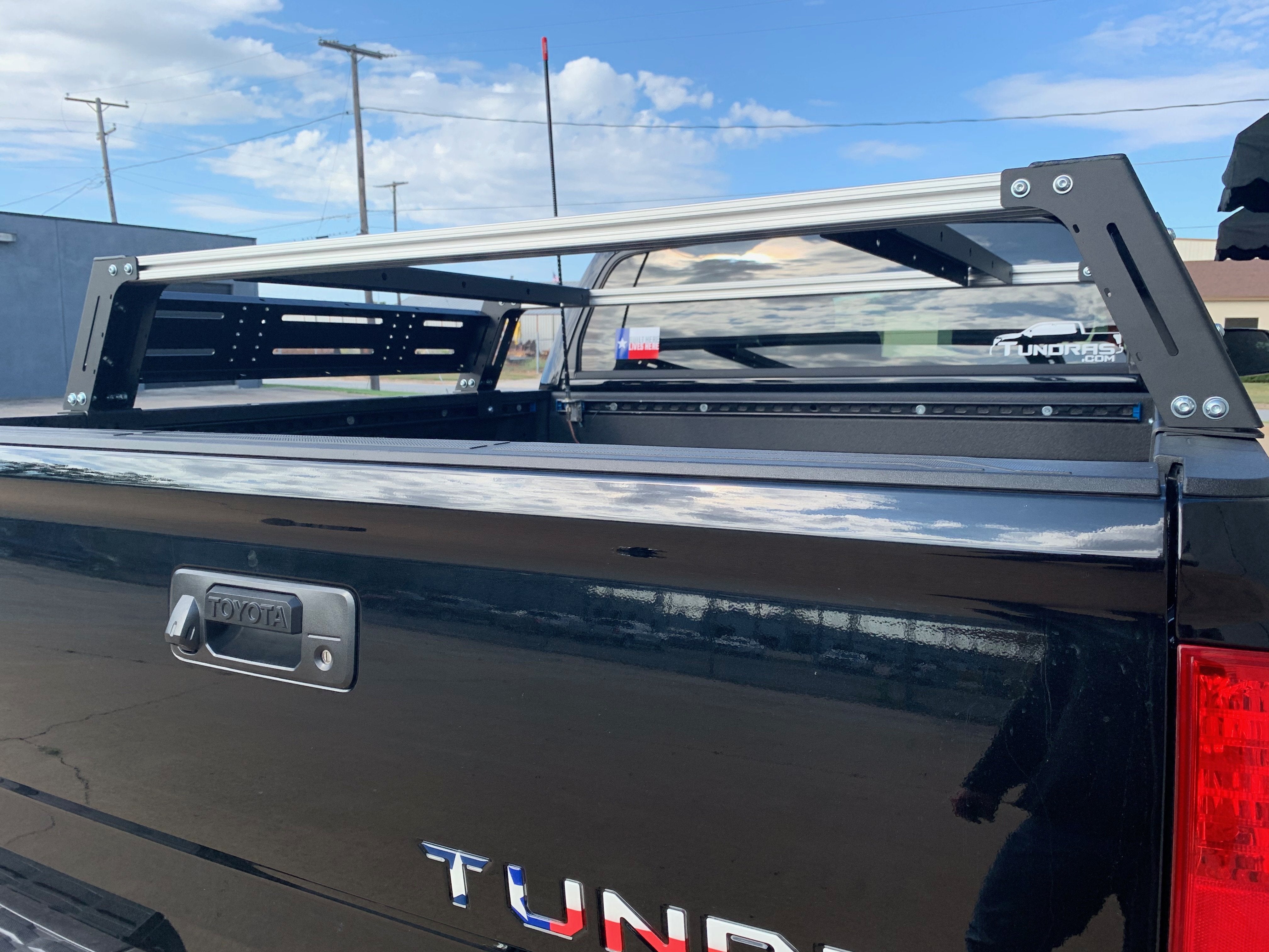 Toyota Tundra truck bed with modular overland rack system installed outdoors