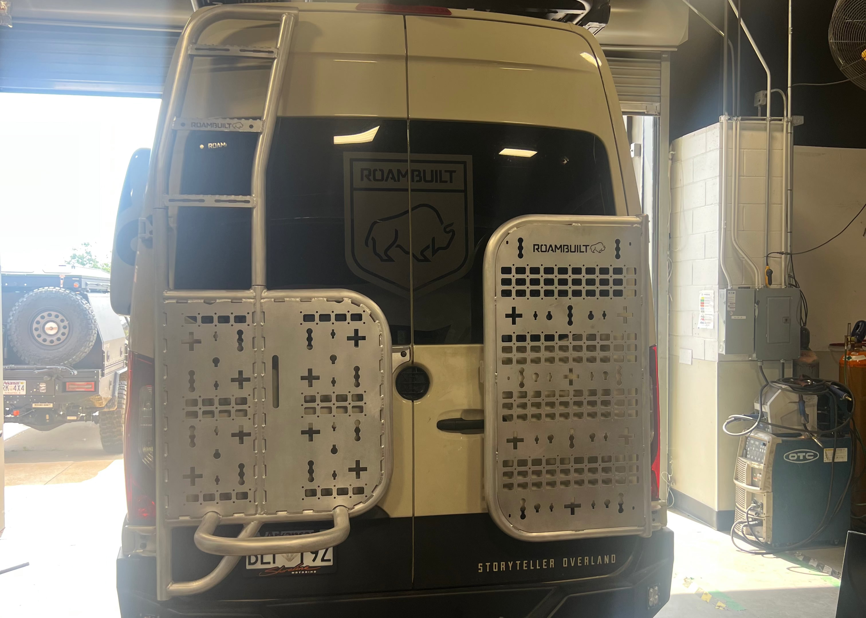 ROAMBUILT Mercedes Sprinter Driver Side Tire Carrier - Ladder Add-on