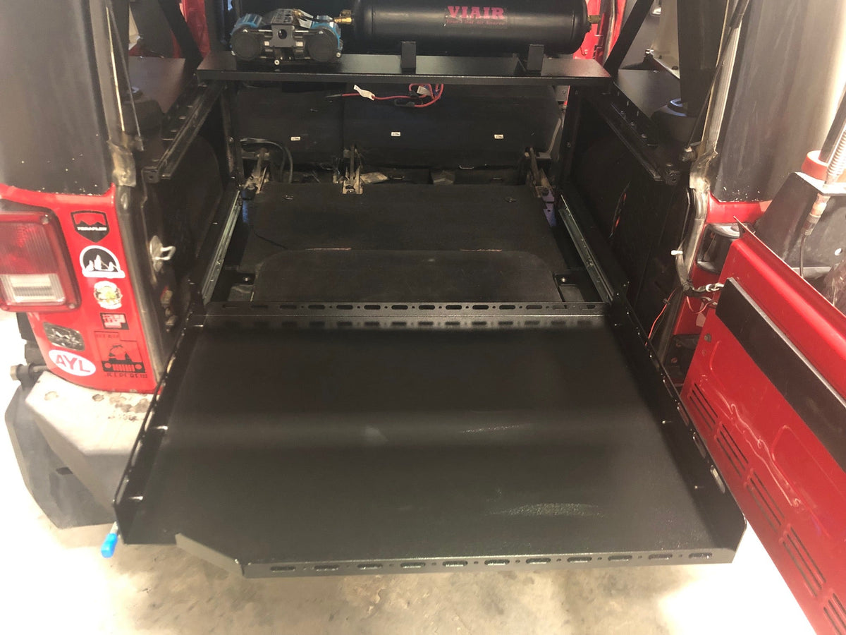 Diabolical Inc Slide Floor extended from a Jeep Wrangler JKU
