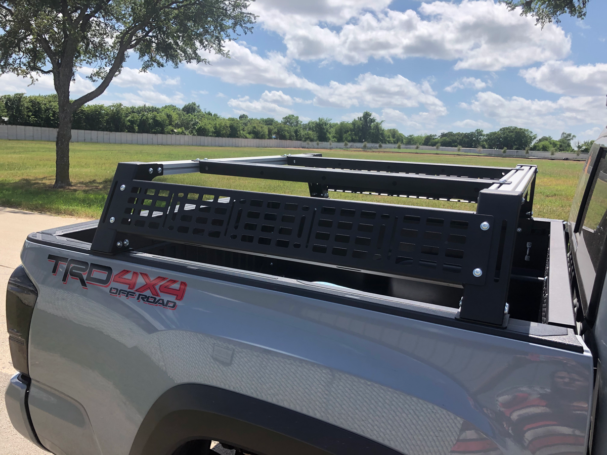 Toyota Tacoma TRD 4x4 with modular bed rack accessory for overlanding and camping gear