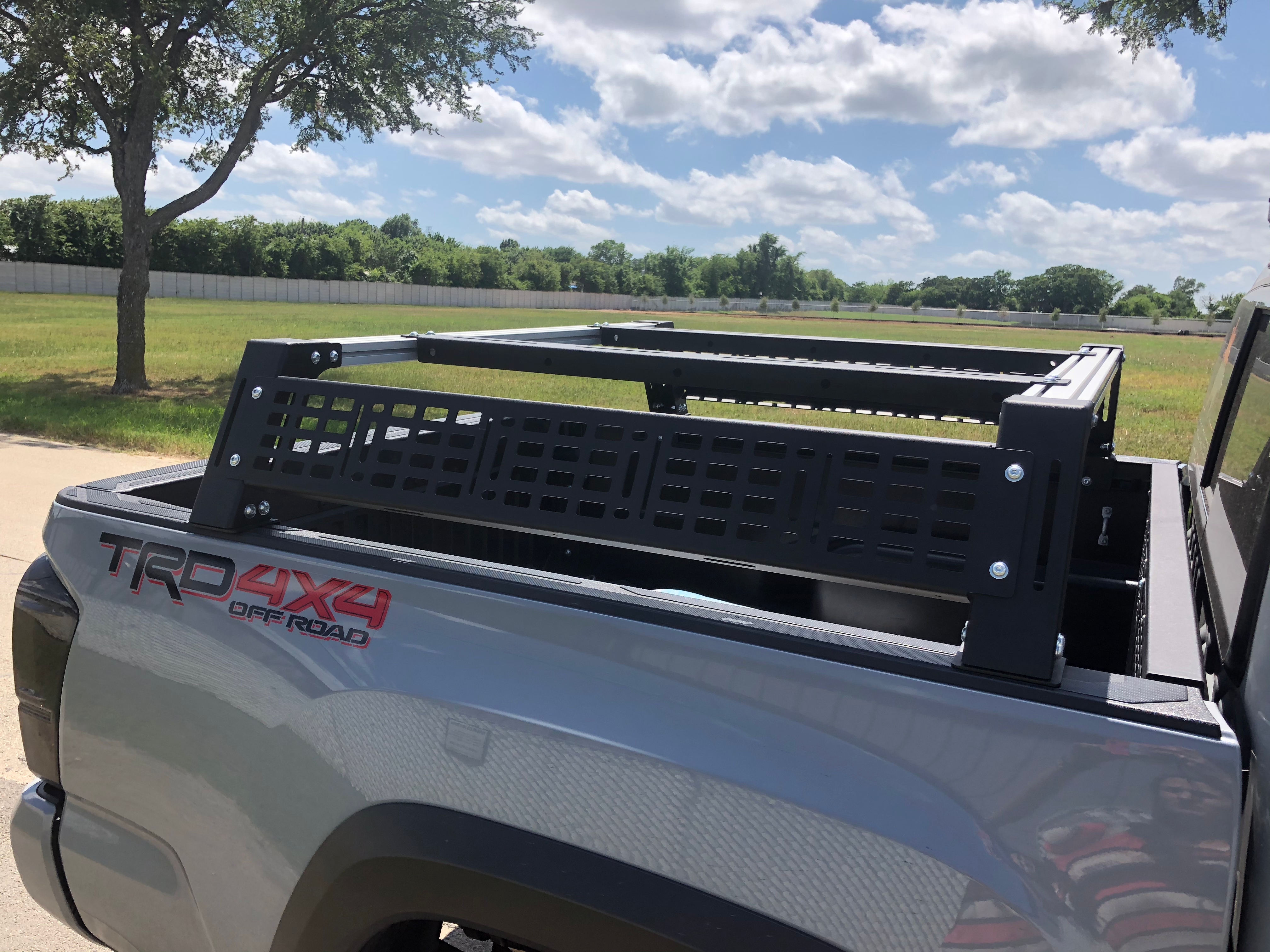 Toyota Tacoma TRD 4x4 with modular bed rack accessory for overlanding and camping gear