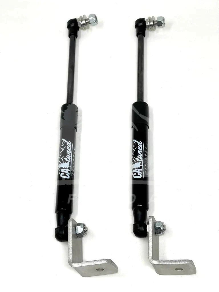 Pair of black off-road hood struts with metal brackets for Toyota Tacoma or 4Runner