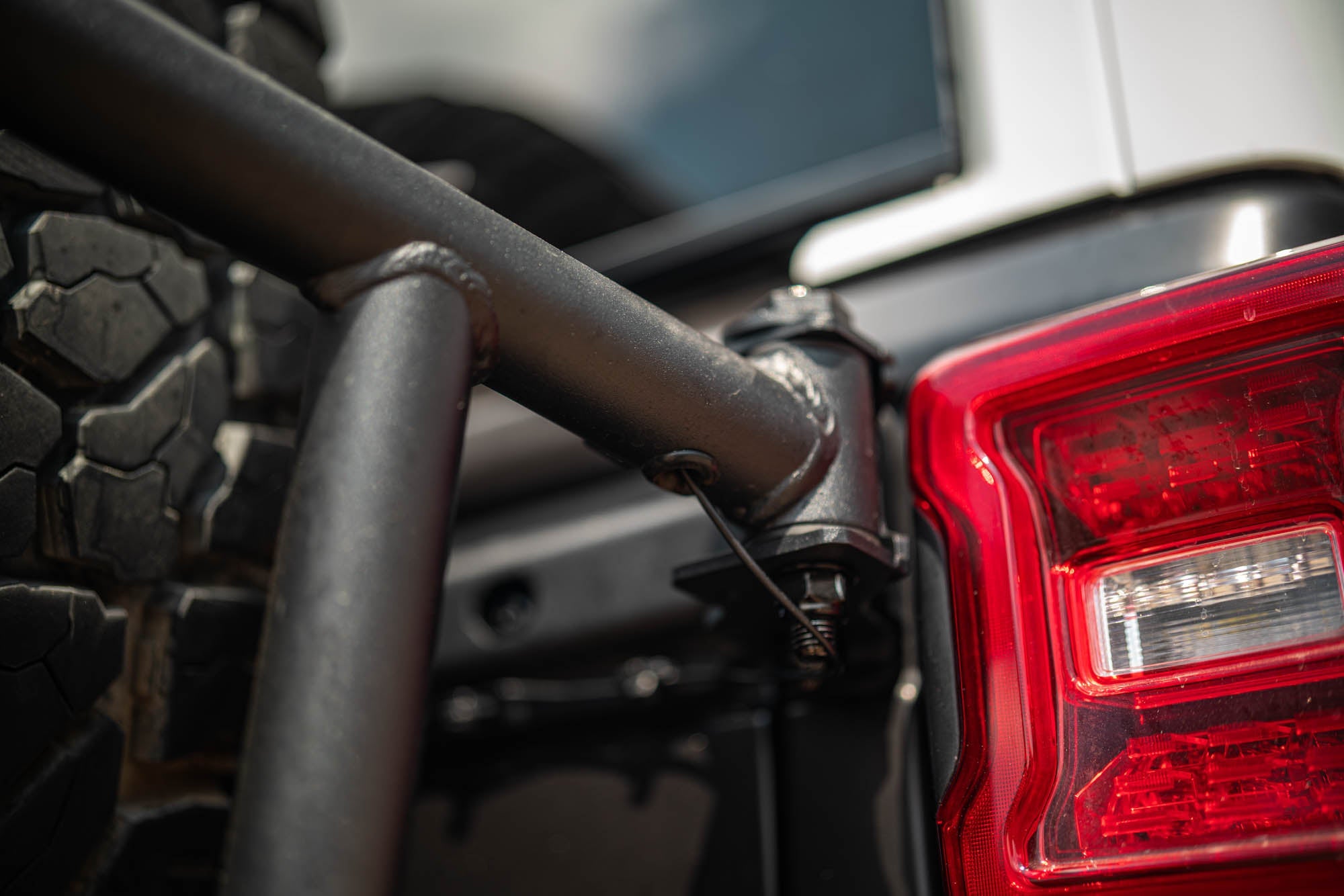 Jeep-Wrangler-JL-Body-Mounted-Tire-Carrier-Installed-5 - NVMOS