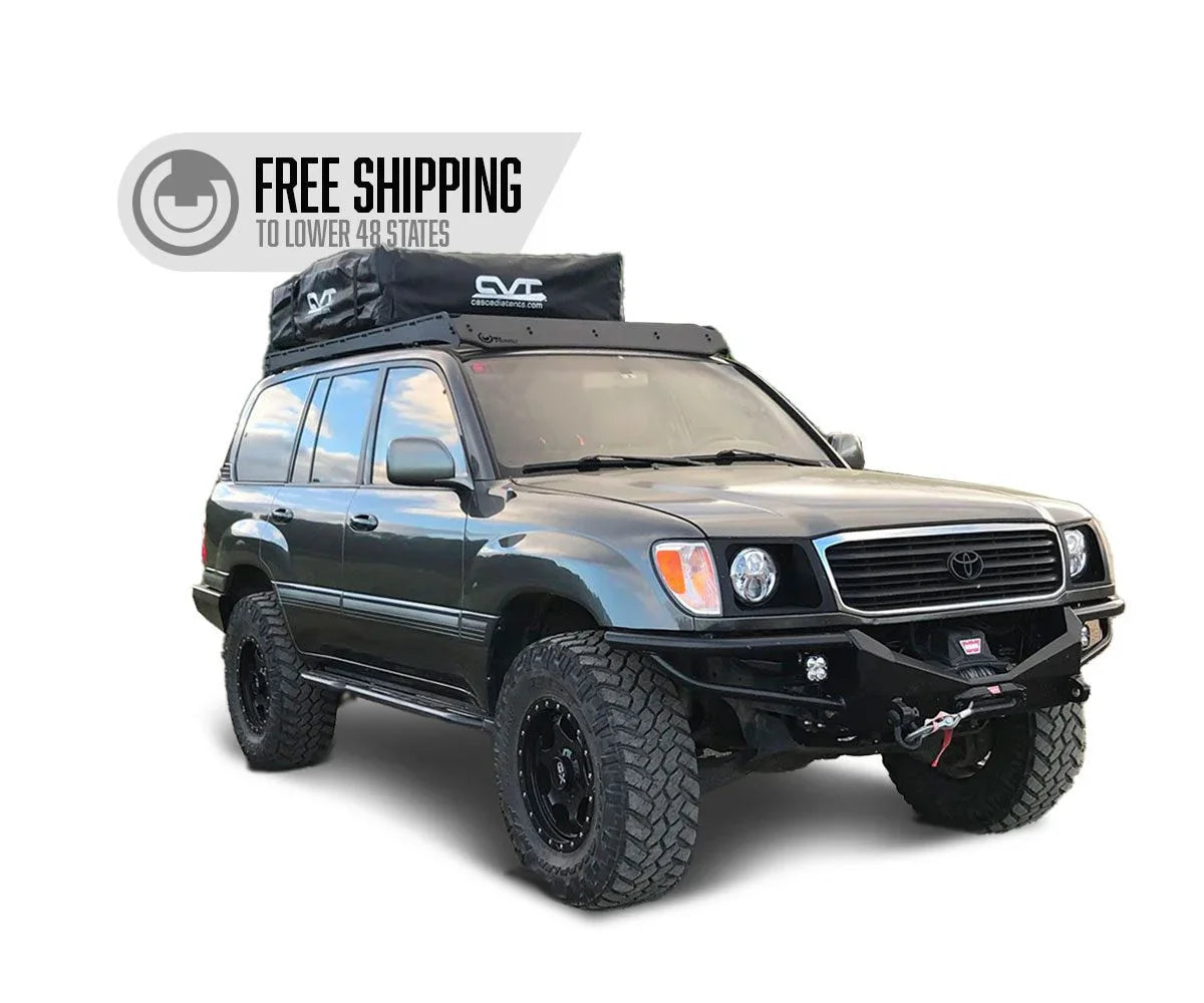 Toyota Land Cruiser with off-road tires, front winch bumper, and rooftop tent, free shipping