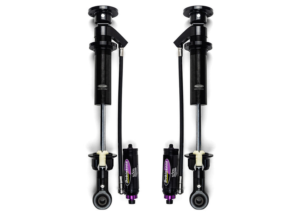 Pair of heavy-duty black off-road shock absorbers with remote reservoirs for trucks or SUVs