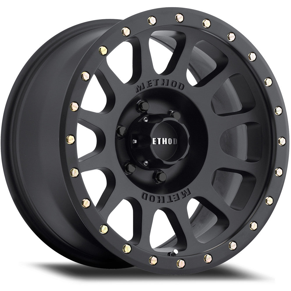 Matte black off-road wheel with multi-spoke design and beadlock bolts for trucks or SUVs