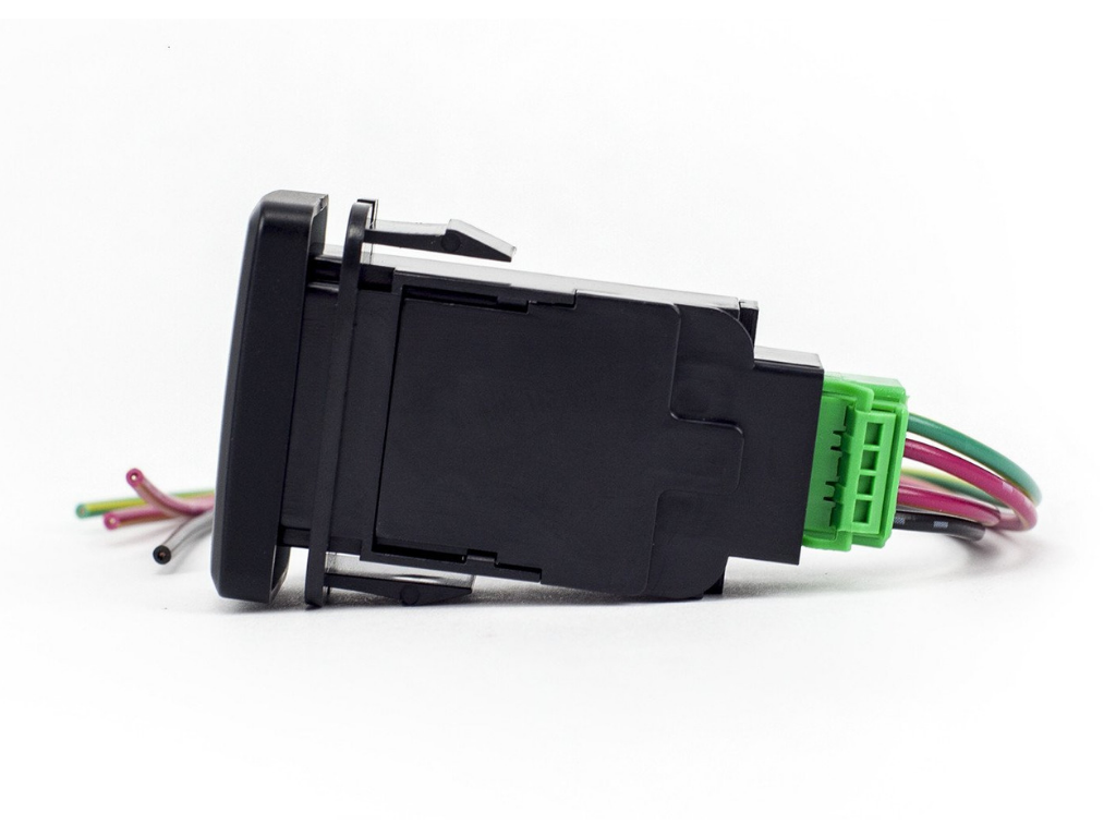 Close-up of rocker switch with wiring harness for overlanding vehicle accessories