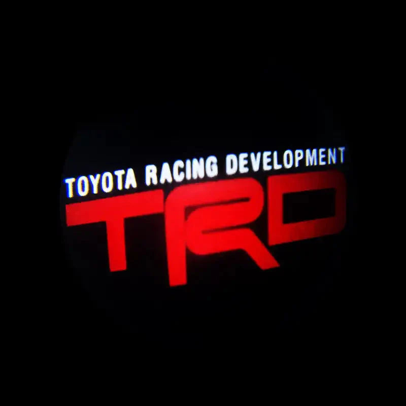 Toyota Racing Development TRD illuminated logo projection in darkness