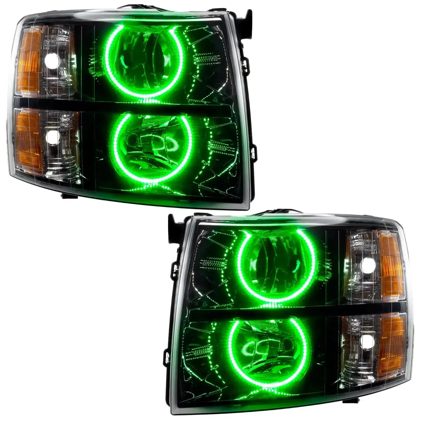 Pair of truck headlights with green LED halo rings and amber reflectors