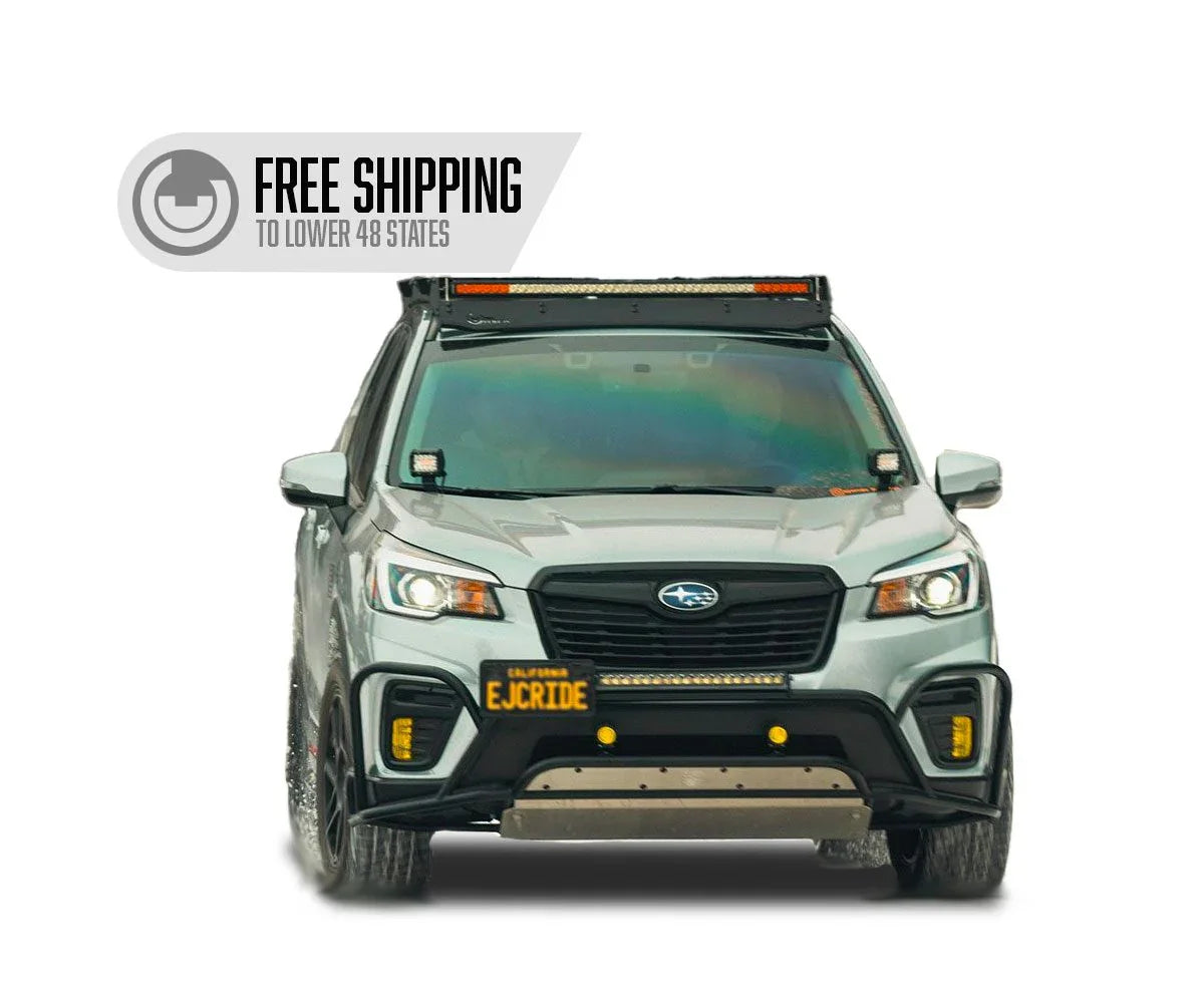 Front view of Subaru Forester with roof rack, off-road lights, and free shipping banner