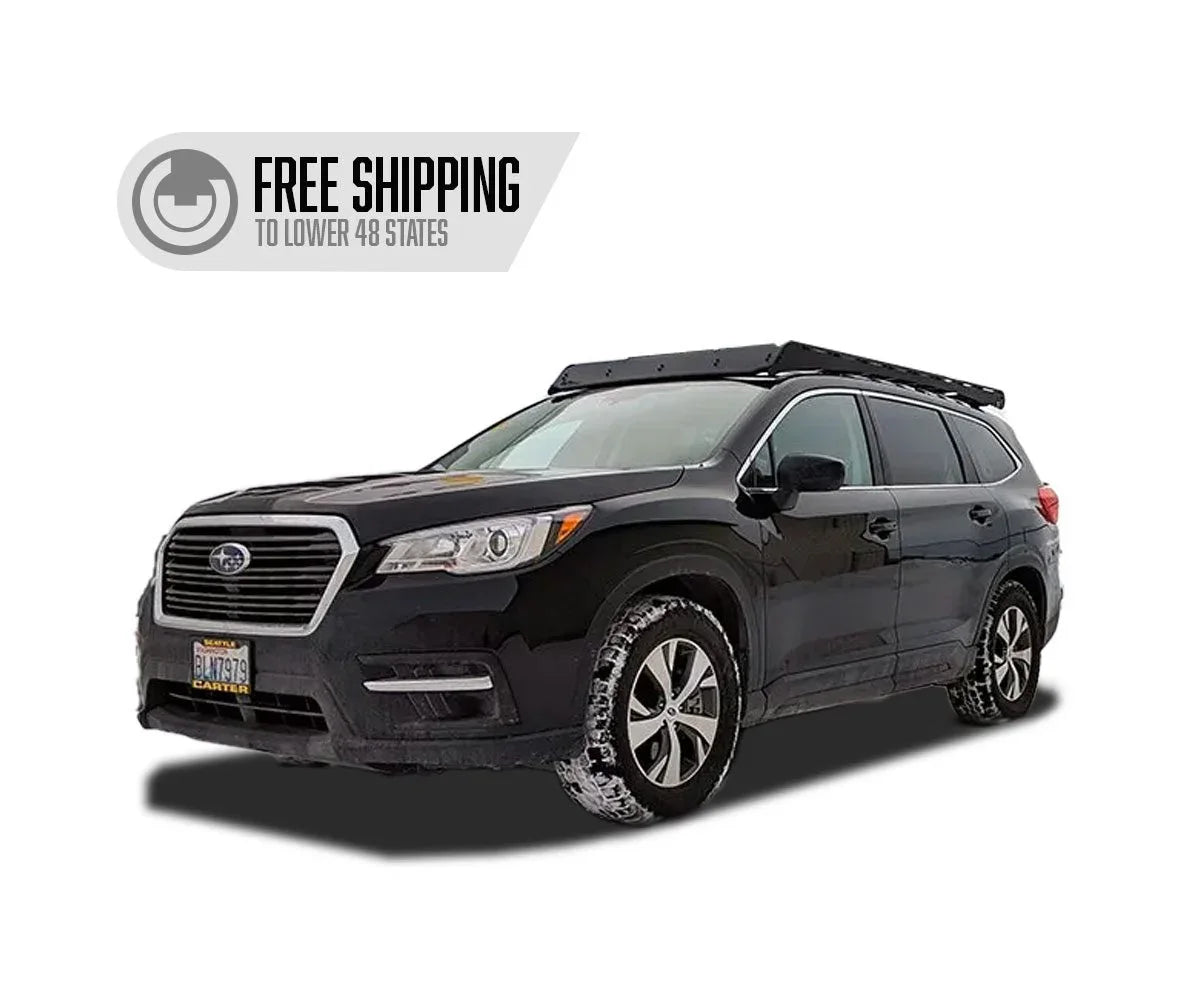 Black Subaru Ascent SUV with roof rack for overlanding and camping gear, isolated on white background