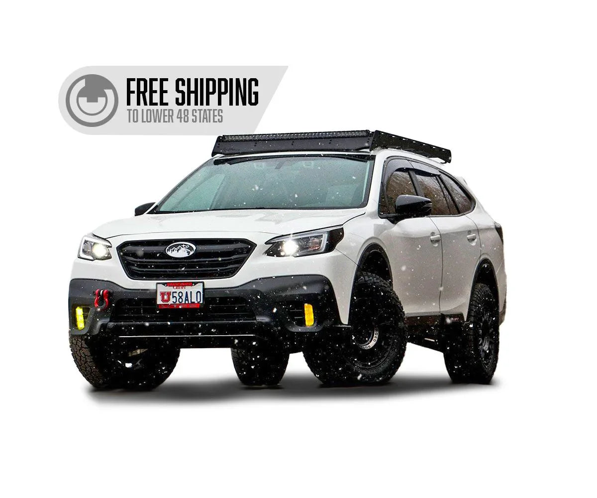 Subaru Outback with Prinsu roof rack, off-road tires, winter adventure gear, free shipping badge