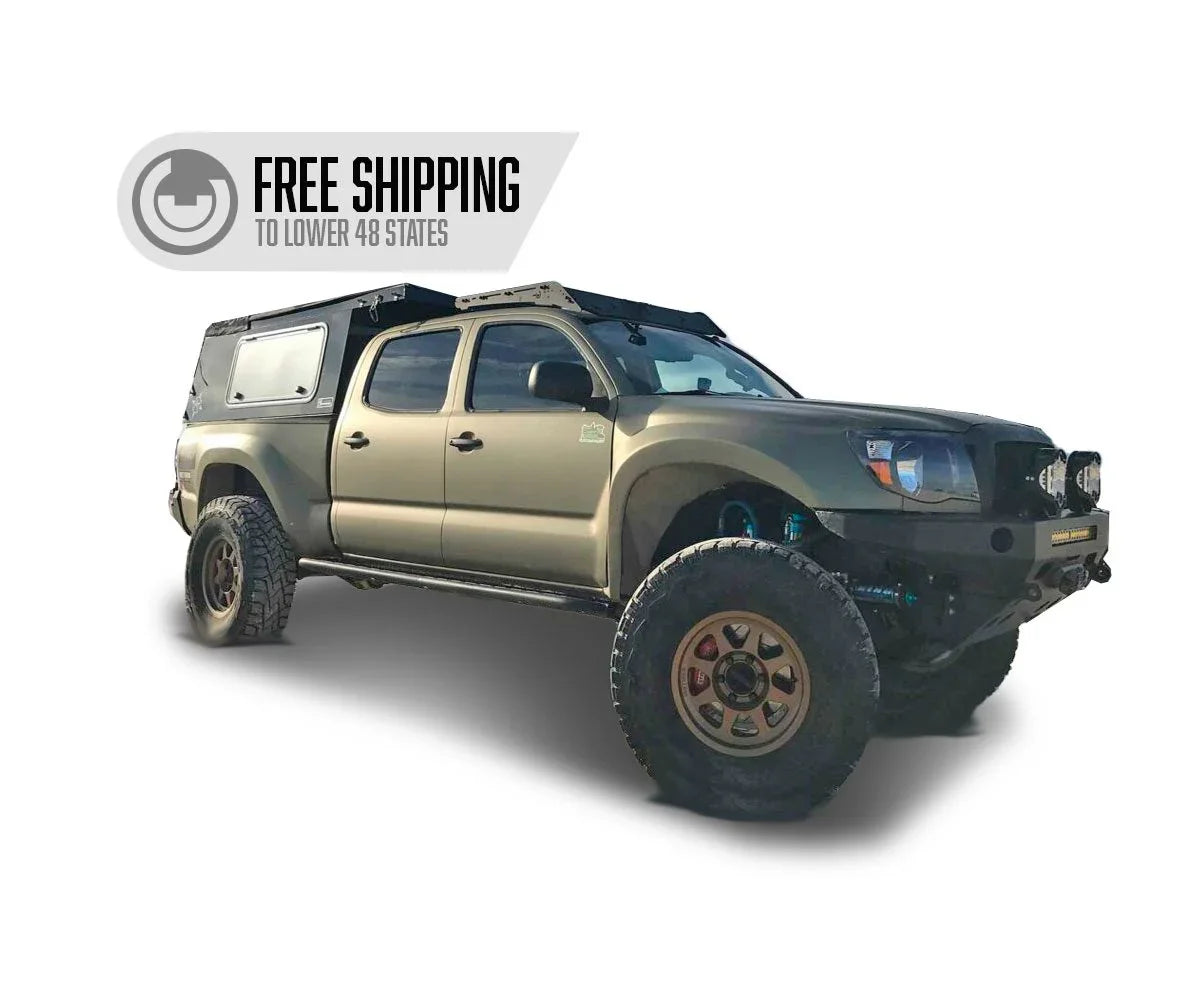 Lifted Toyota Tacoma with overland rack and habitat camper, free shipping offer shown
