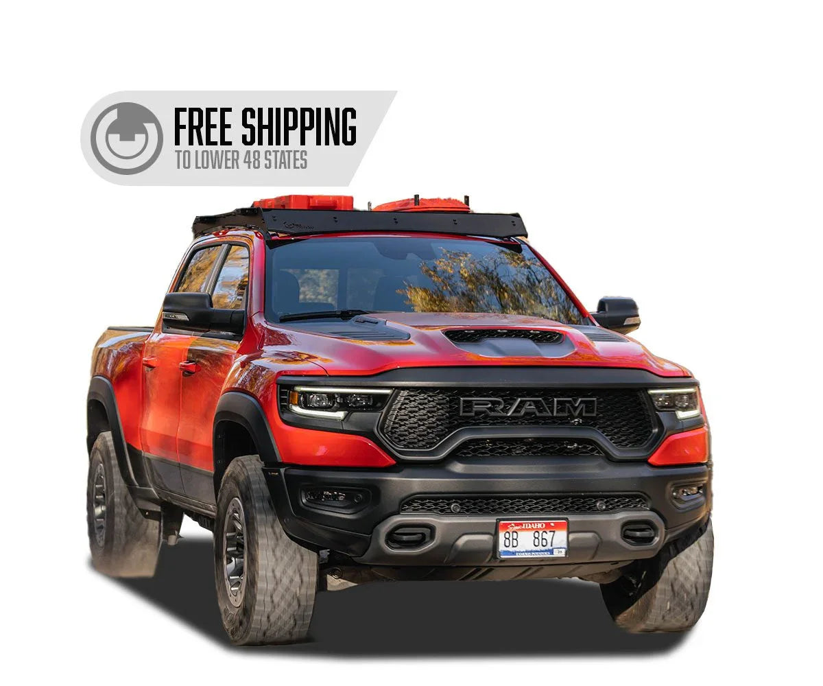 Red RAM TRX truck with Prinsu roof rack shown on white background