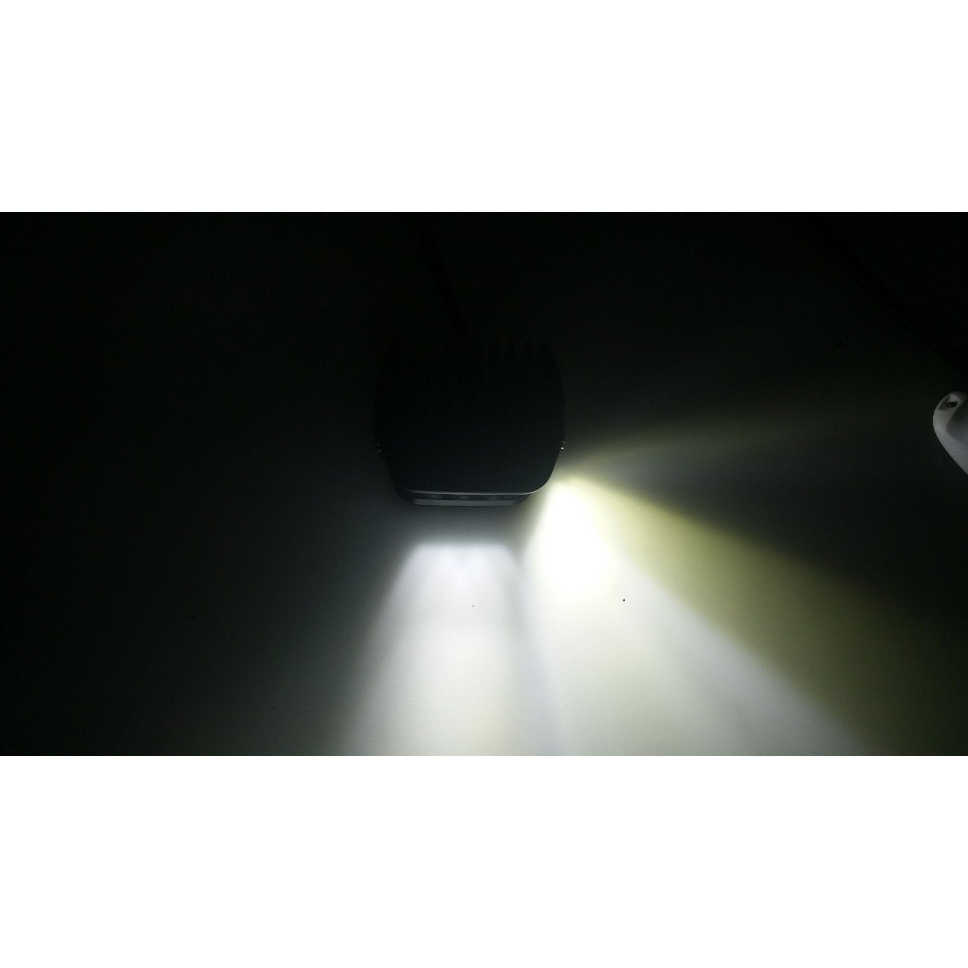 LED off-road driving light pod emitting white and yellow beams for overland vehicles
