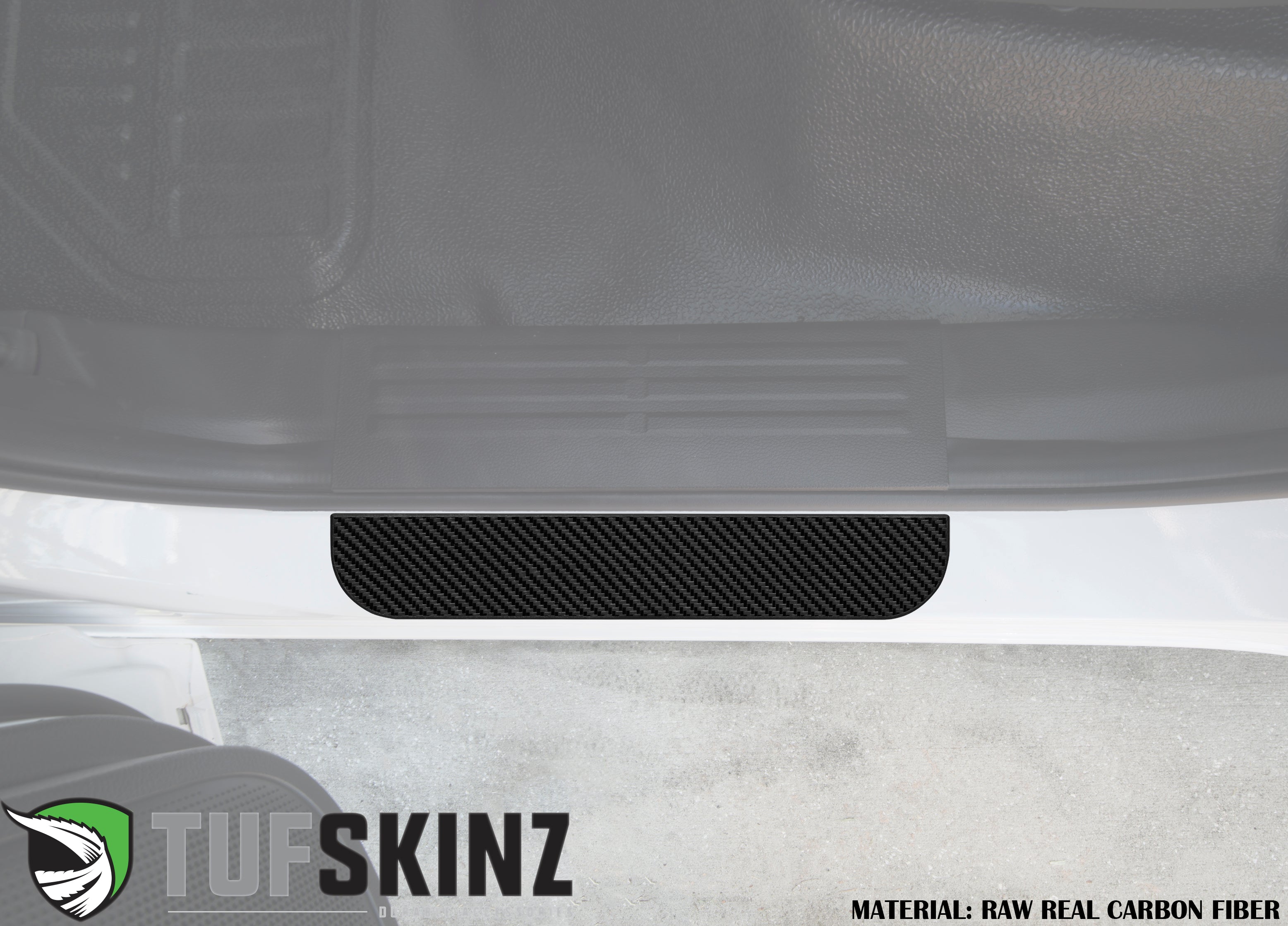 Carbon fiber door sill protector installed on vehicle entry step, interior view