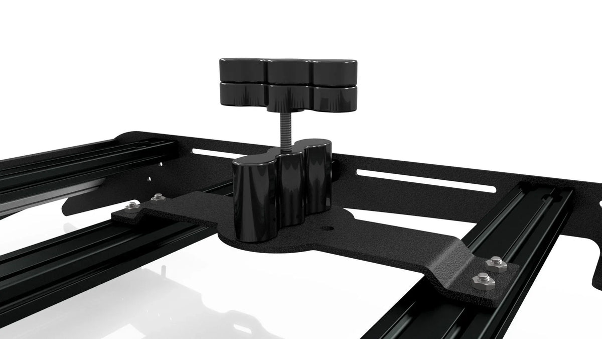 Two bar mount bracket for RotoPax fuel container on modular roof rack, close-up view