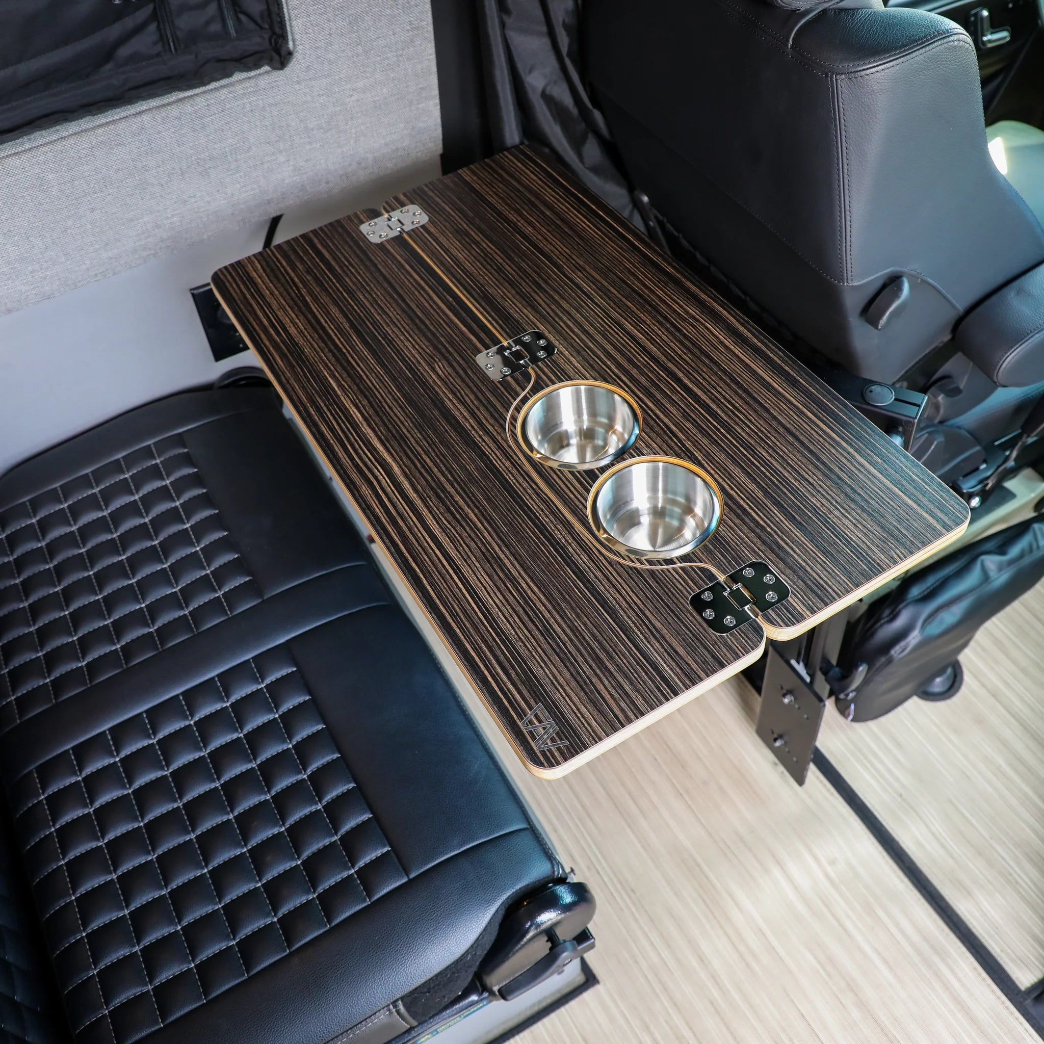 Foldable wood grain vehicle camping table with two cup holders installed between car seats
