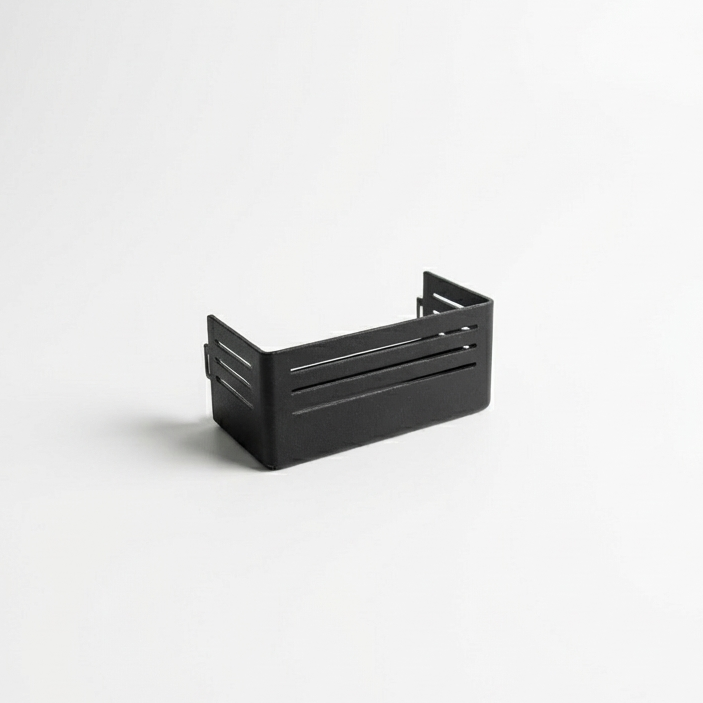 Black metal overlanding gear storage bracket with slotted sides on white background