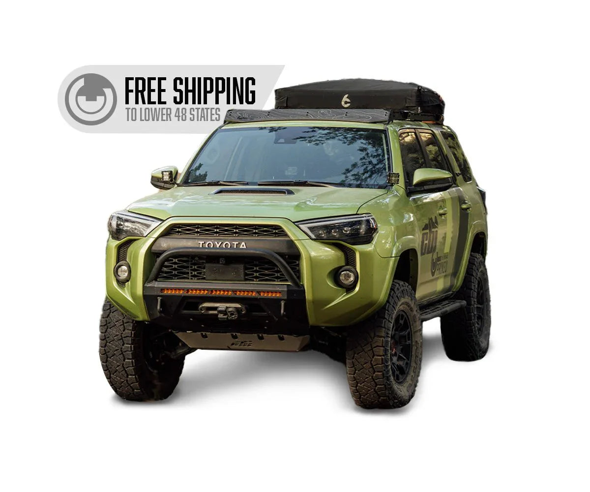 Green Toyota 4Runner overland SUV with roof rack and free shipping banner for off-road gear