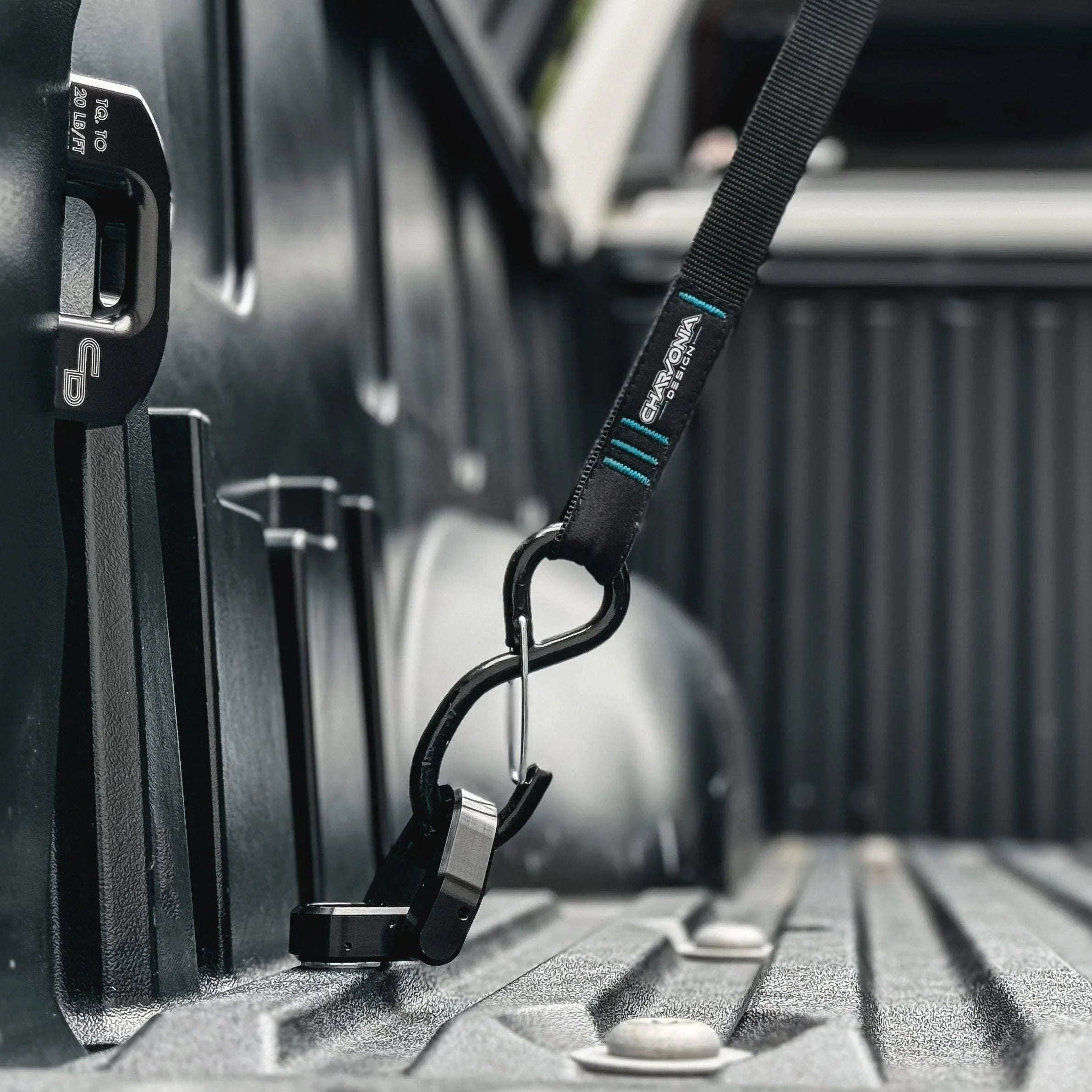 Black anodized bed tie down anchor for Toyota Tundra truck bed securement