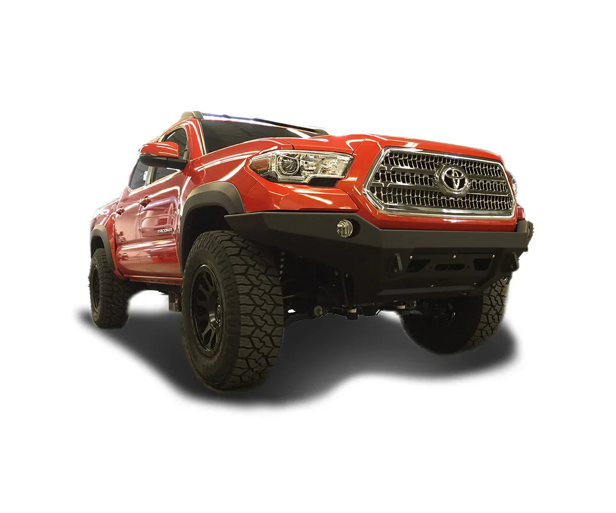 Red Toyota Tacoma with off-road tires and heavy-duty front bumper upgrade