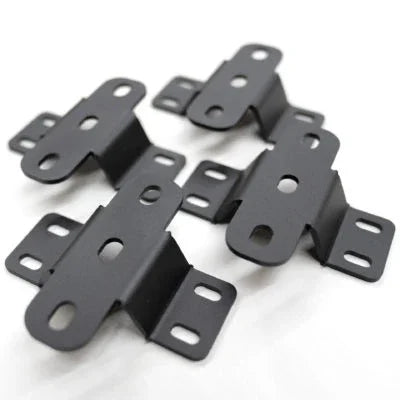 Set of four black steel tent mounting feet with multiple bolt holes for overlanding racks
