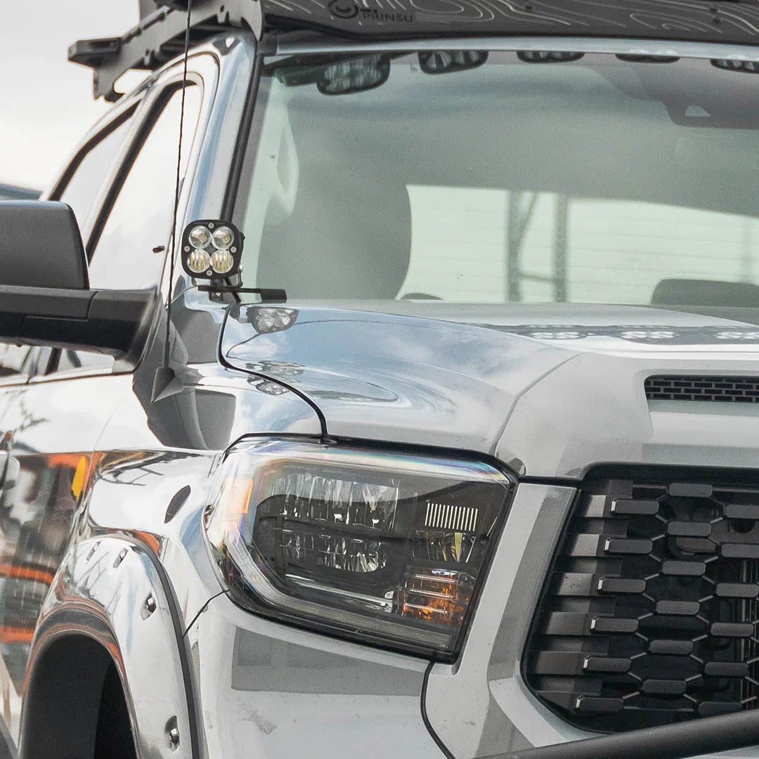 Toyota Tundra with ditch light brackets and LED pod lights mounted near hood