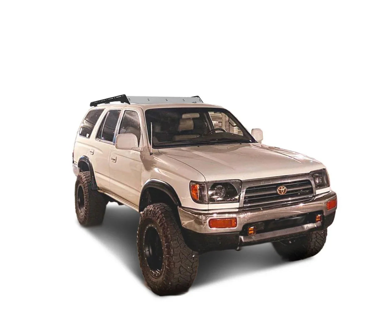 Toyota 4Runner with Prinsu 3/4 roof rack, off-road tires, white background