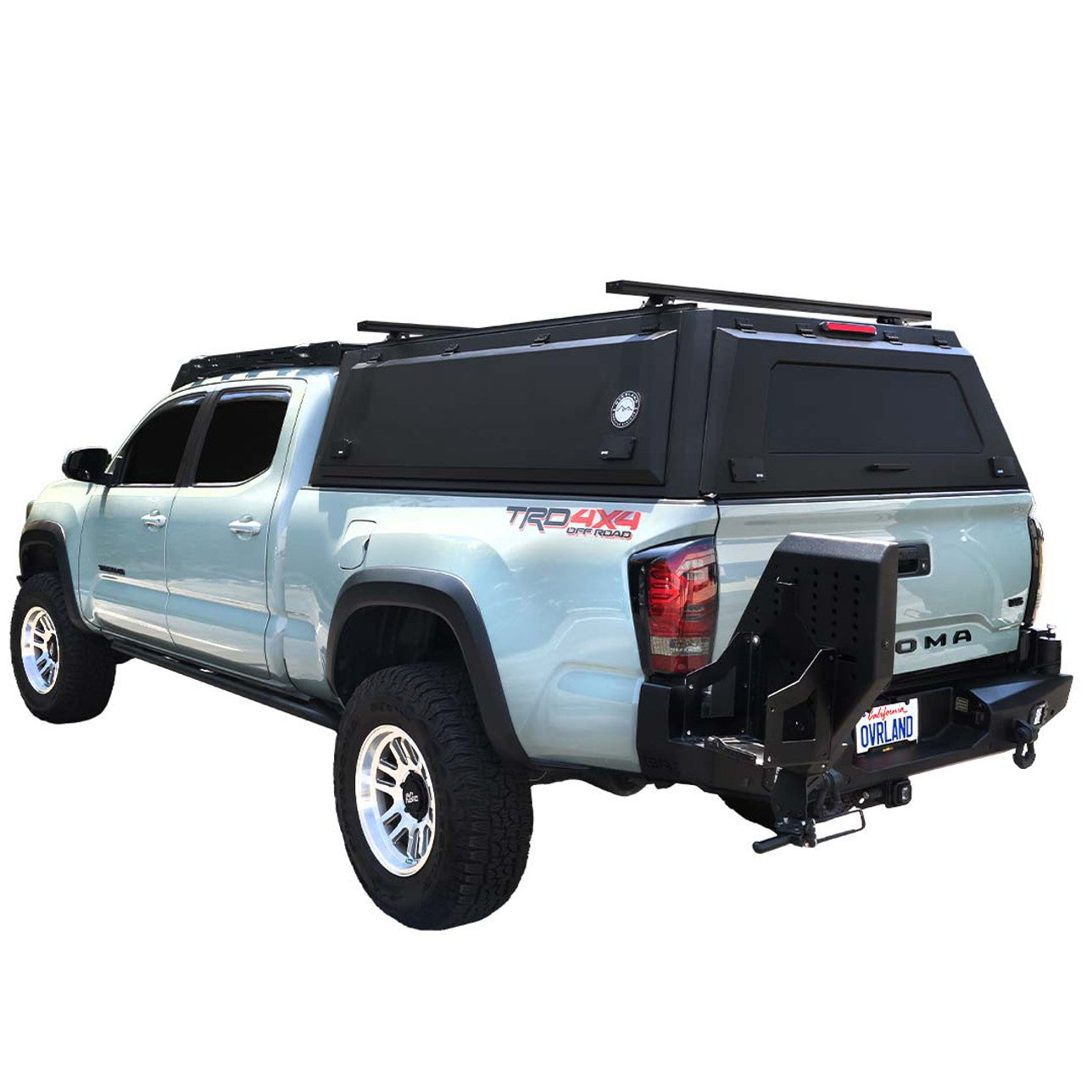 Toyota Tacoma truck cap with gull-wing side doors open