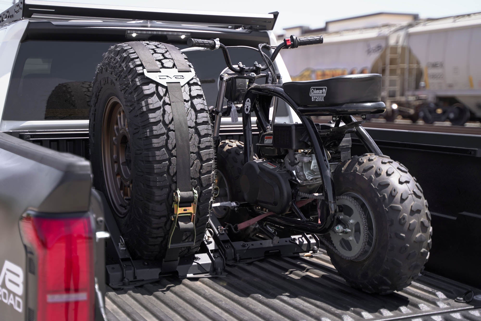 Truck-Bed-Universal-Tire-Carrier-_-Accessory-Mount-Installed-11 - NVMOS