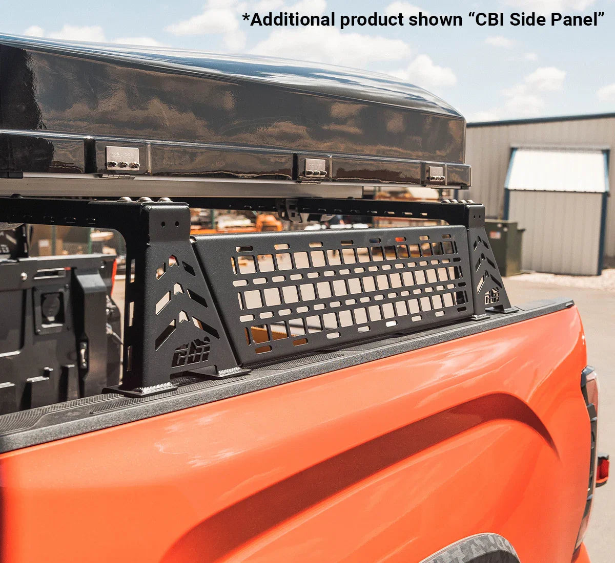 CBI side panel accessory mounted on orange Toyota Tundra truck bed rack for overlanding
