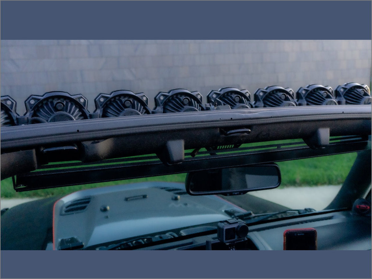 Diabolical Inc Visor Shelf for Jeep Wrangler with radio mounted