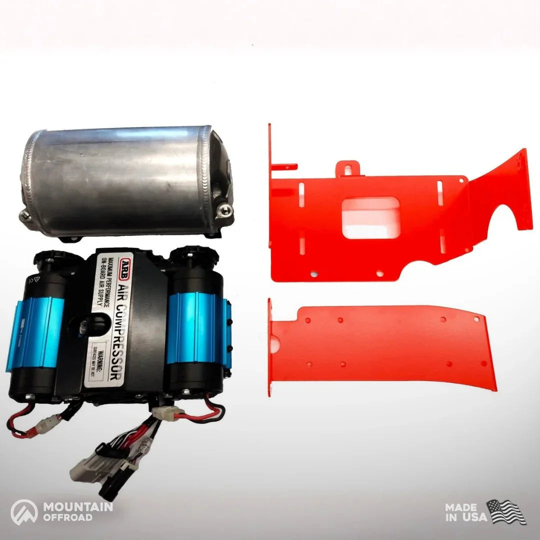 ARB air compressor kit with silver air tank and red mounting bracket for Toyota Tacoma