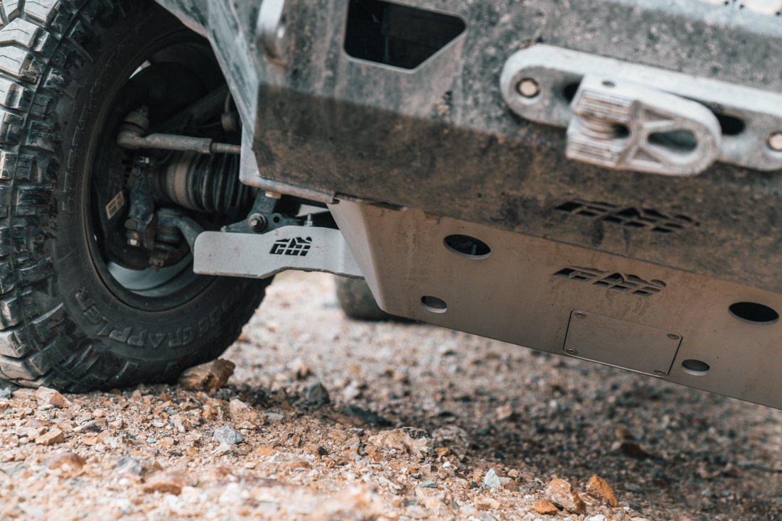 Toyota Tacoma lower control arm skid plates and undercarriage protection on rocky trail