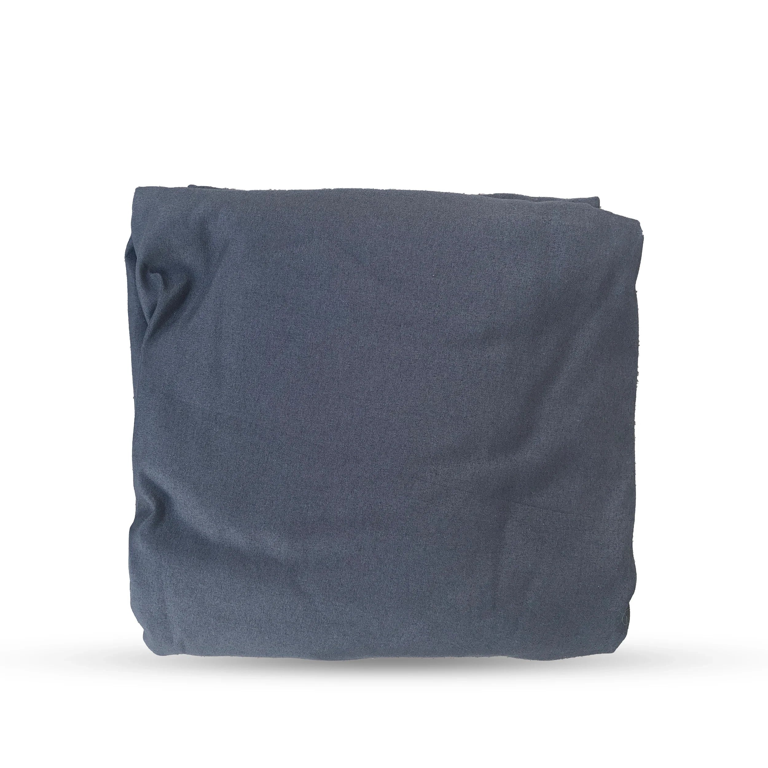 Folded dark gray cotton sheet for camping and overlanding bedding.