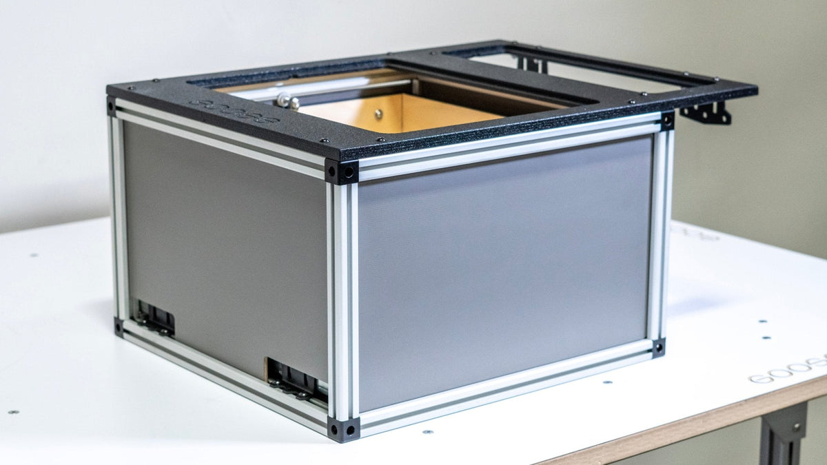 Goose Gear camper system front utility module with the top lid opened to show the wood-lined interior