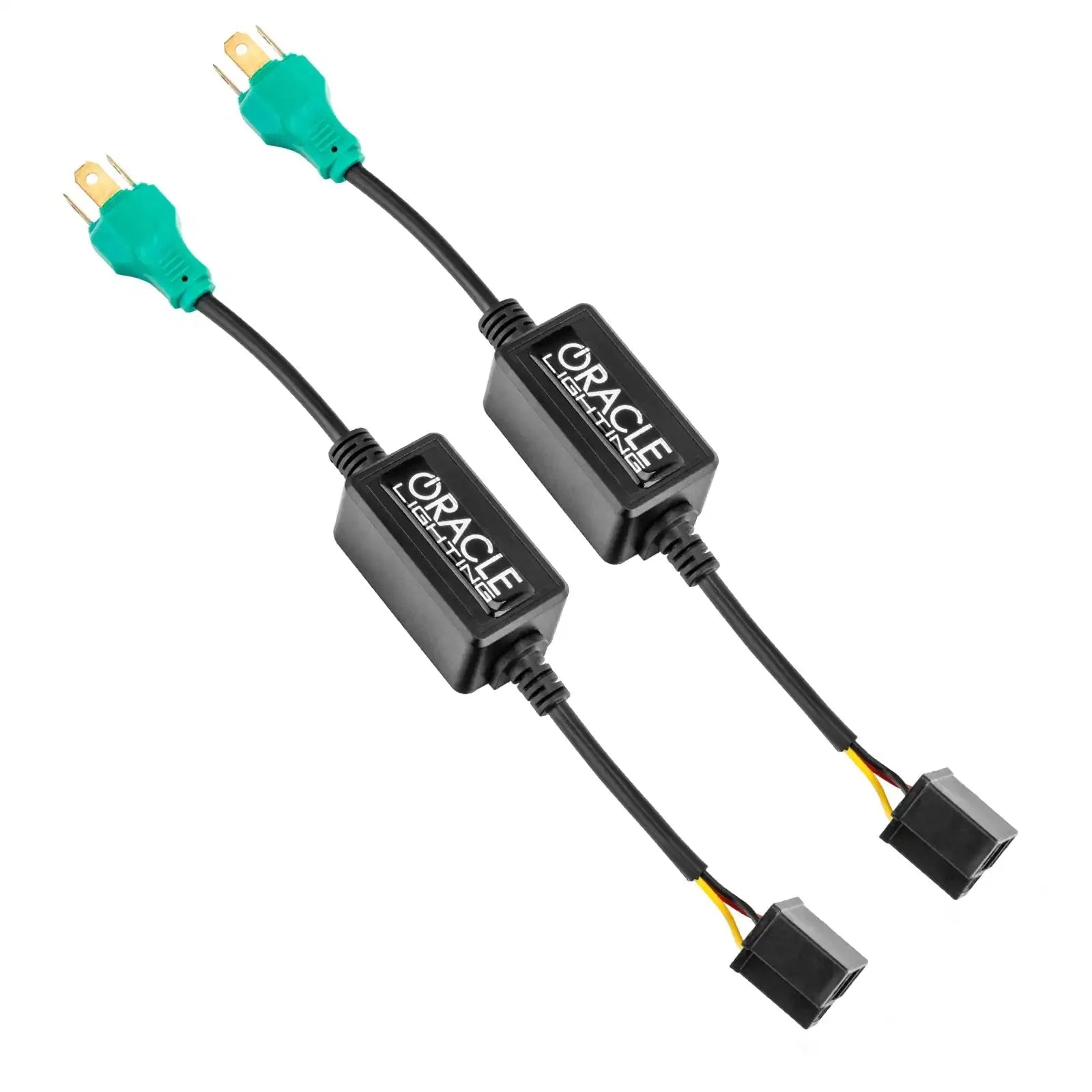 Pair of Oracle Lighting headlight anti-flicker harness adapters with black and green connectors