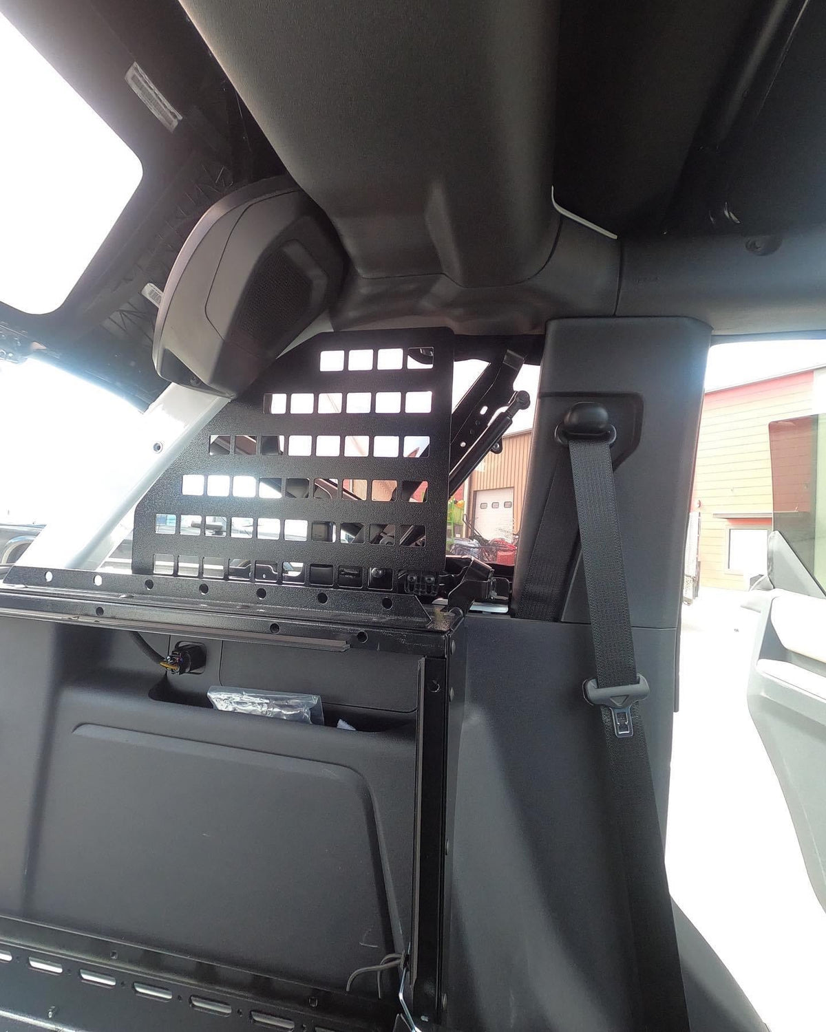 Diabolical Inc roll bar MOLLE panels in a Ford Bronco