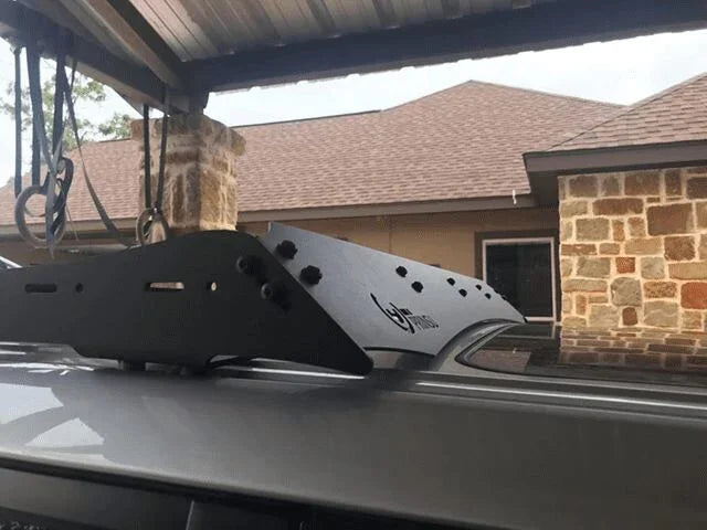 Black steel roof rack side panel mounted on a Toyota SUV for overlanding accessories