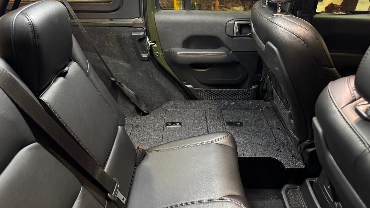 Goose Gear V2 second row seat delete plate system in a 2024+ Jeep Wrangler JLU 4 Door