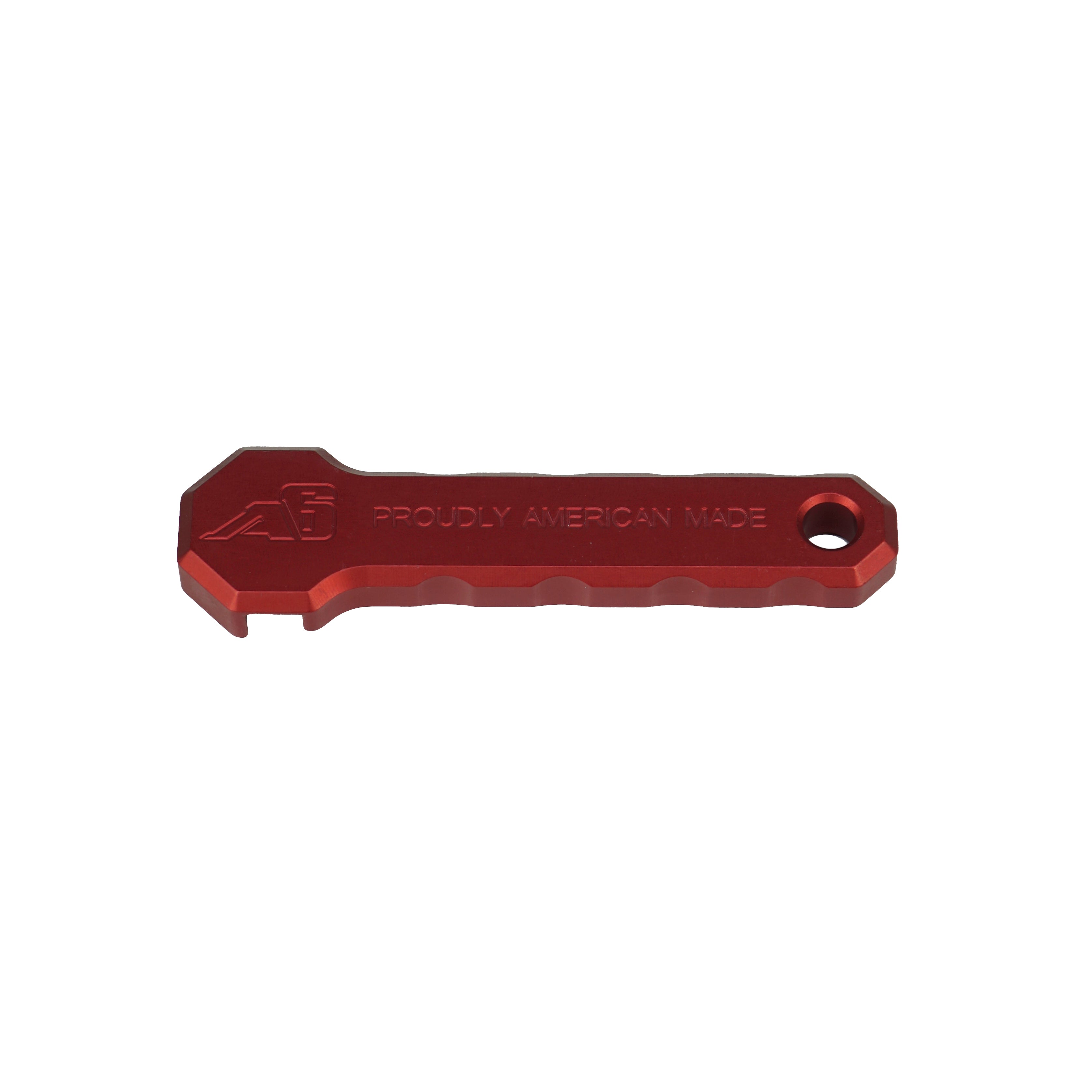 Red aluminum knob wrench tool with textured grip, ideal for off-road vehicle accessories