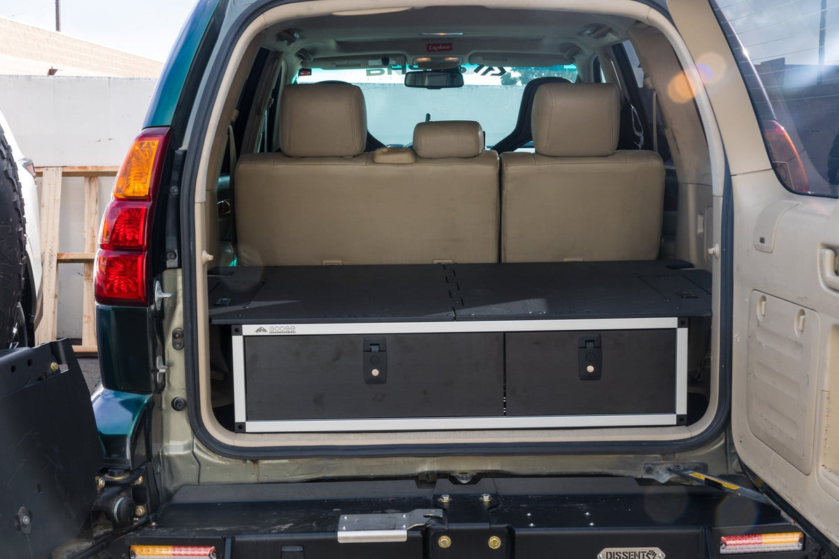 Goose Gear side by side drawer module in a Lexus GX470 cargo area, fitted top plate with two drawers below