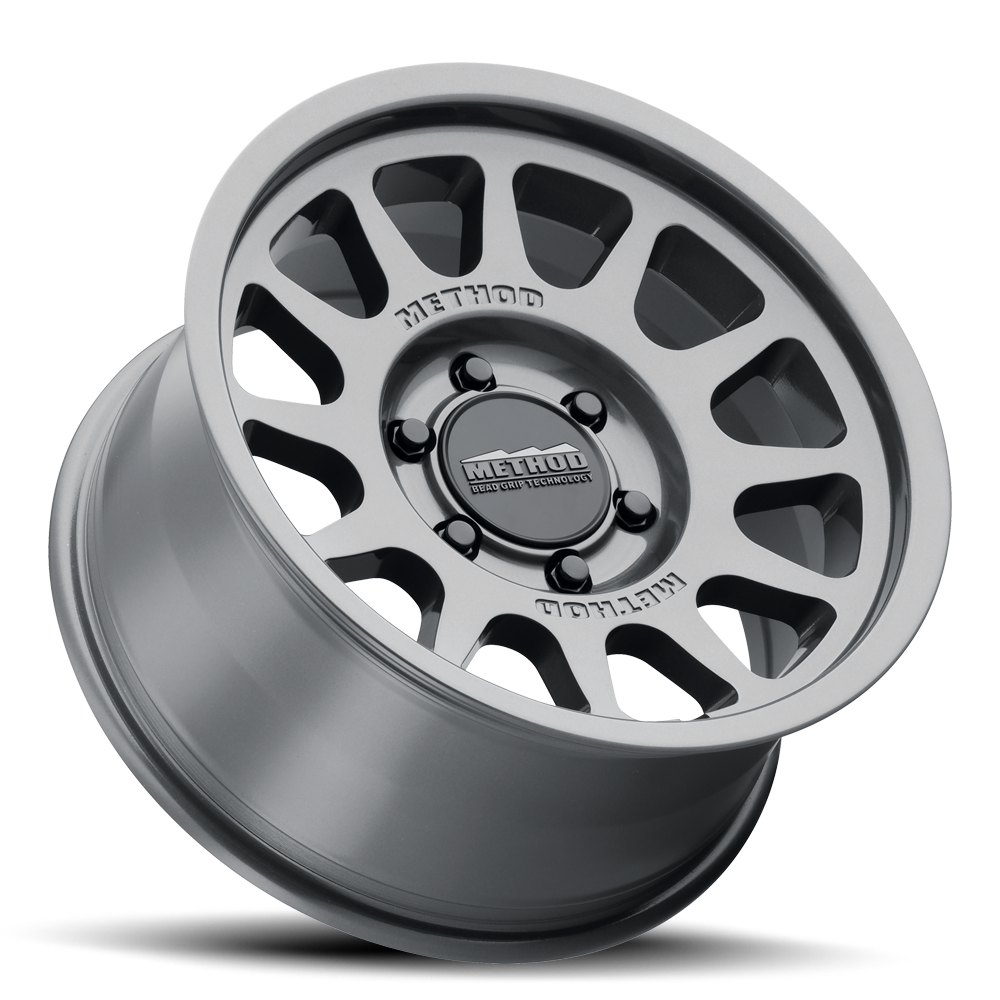 method-mr703-wheel-6lug-gloss-titanium-17x8-5-lay-1000_93c13225-695d-43e6-9b89-986bdc5589b9 - NVMOS