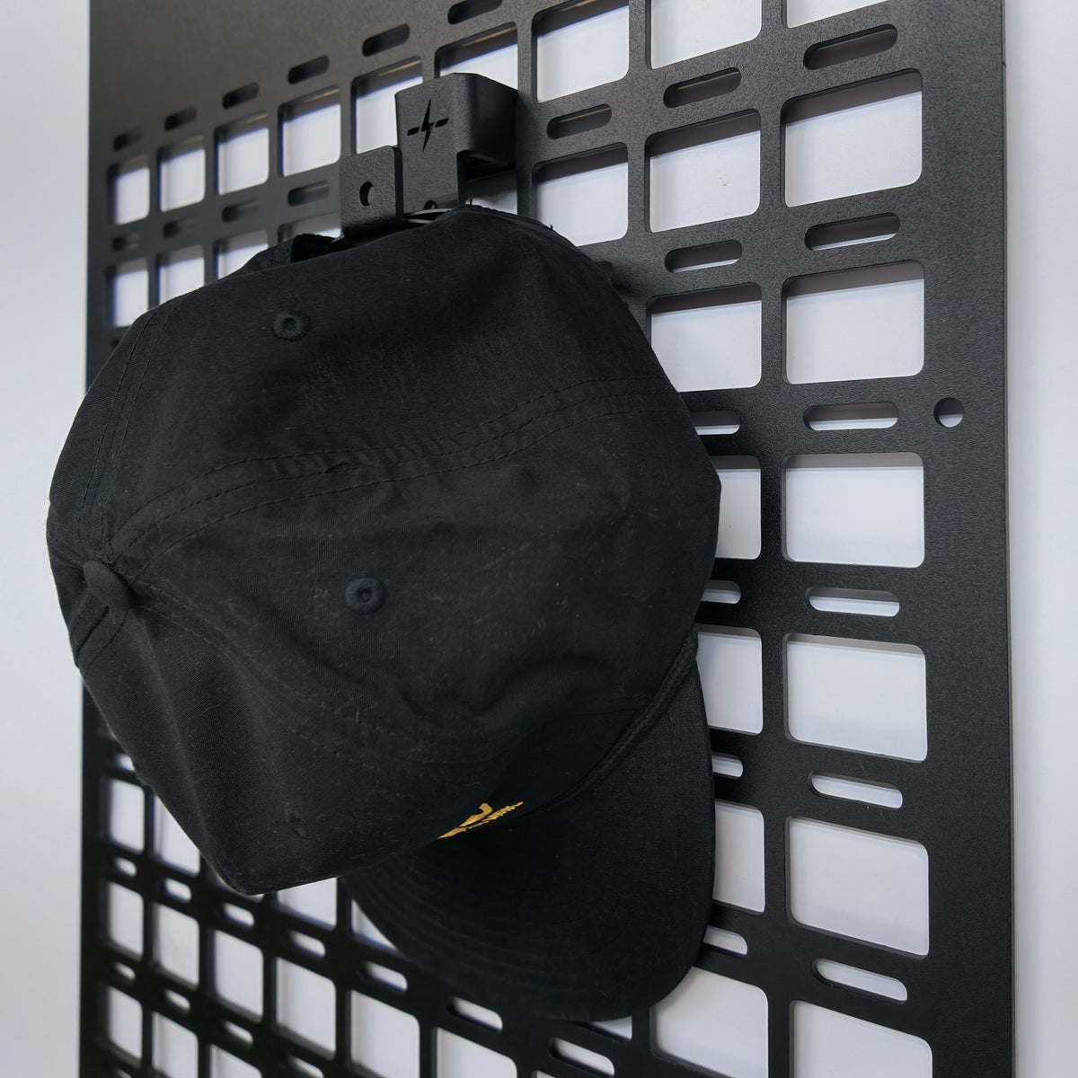 MOLLE drop-in hook holding a hat